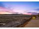 An incredible city view showcasing city lights and a skyline vista from an elevated vantage point at 577 Overlook Rim Dr, Henderson, NV 89012