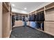 Walk-in closet with custom built-in shelving and racks for ample storage at 577 Overlook Rim Dr, Henderson, NV 89012