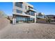 Modern home with large backyard, balconies, and walls of glass at 577 Overlook Rim Dr, Henderson, NV 89012