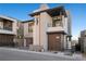 Stunning modern home features clean lines, a balcony, and low-maintenance desert landscaping at 577 Overlook Rim Dr, Henderson, NV 89012