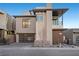 Modern home showcasing clean lines, neutral color palette, and contemporary design elements at 577 Overlook Rim Dr, Henderson, NV 89012