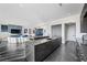 Open concept kitchen flows into the living space for seamless entertaining at 577 Overlook Rim Dr, Henderson, NV 89012