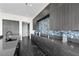 The kitchen features sleek gray cabinets and stainless steel appliances at 577 Overlook Rim Dr, Henderson, NV 89012