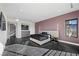 Modern bedroom with beautiful black marble floors and stylish furnishings at 577 Overlook Rim Dr, Henderson, NV 89012