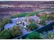 A stunning aerial view showcasing the property's layout and landscaping within a luxurious neighborhood at 584 Saint Croix St, Henderson, NV 89012