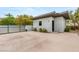 Exterior building with a gated driveway, clean design, and neutral color palette at 584 Saint Croix St, Henderson, NV 89012