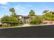 Beautiful exterior elevation showing the front yard and unique architectural details at 584 Saint Croix St, Henderson, NV 89012