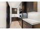 Convenient butler's pantry features sleek cabinetry and ample counter space at 584 Saint Croix St, Henderson, NV 89012