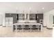 Bright kitchen with a large island, modern appliances, and sleek cabinets at 584 Saint Croix St, Henderson, NV 89012