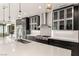 Well-equipped kitchen with stainless steel appliances, quartz countertops, and custom cabinetry at 584 Saint Croix St, Henderson, NV 89012