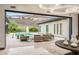 Bright living room with indoor-outdoor flow and views of the pool at 584 Saint Croix St, Henderson, NV 89012