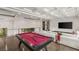 This living room offers a billiard table, comfortable sofa, and recessed ceiling lights at 584 Saint Croix St, Henderson, NV 89012