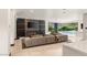 Open living room with views of the pool and outdoor space at 584 Saint Croix St, Henderson, NV 89012