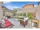 Inviting backyard oasis featuring a patio, hammock, and charming landscaping with a wall for privacy at 6717 Lincoln Wood St, Las Vegas, NV 89149