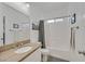 Simple bathroom featuring a shower-tub combo at 6717 Lincoln Wood St, Las Vegas, NV 89149