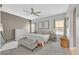 Spacious bedroom featuring a ceiling fan and natural light at 6717 Lincoln Wood St, Las Vegas, NV 89149
