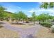Beautiful community park with walking paths, lush trees, and a gazebo, ideal for outdoor recreation at 6717 Lincoln Wood St, Las Vegas, NV 89149