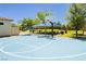 Well-maintained community basketball court with benches and shaded seating provides a great recreational space at 6730 Pivot Point St, Las Vegas, NV 89148