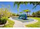 A fun community playground area with colorful equipment is set in a well-landscaped green space at 6730 Pivot Point St, Las Vegas, NV 89148