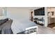 Open and spacious bedroom with a large tv, plush carpet, and modern decor at 6938 Feather Hill St, North Las Vegas, NV 89086