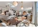 Open-concept dining area seamlessly connecting to the kitchen and living room, ideal for entertaining and everyday living at 6938 Feather Hill St, North Las Vegas, NV 89086