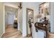 Charming hallway featuring wood-like floors, decor, and elegant touches that adds character to the home at 6938 Feather Hill St, North Las Vegas, NV 89086