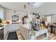 Spacious kitchen featuring an island, stainless steel appliances, and ample counter space, perfect for culinary enthusiasts at 6938 Feather Hill St, North Las Vegas, NV 89086