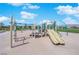 Community playground with slides, climbing structures, and safety surfacing for Gathering fun at 6938 Feather Hill St, North Las Vegas, NV 89086