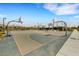 Community basketball court surrounded by desert landscaping and other neighborhood amenities at 7011 Toll Mountain St, North Las Vegas, NV 89086