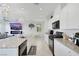 Kitchen area featuring stainless steel appliances and granite countertops at 7011 Toll Mountain St, North Las Vegas, NV 89086