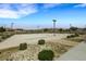 Community sand volleyball court surrounded by desert landscape at 7011 Toll Mountain St, North Las Vegas, NV 89086