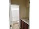 A bathroom with tile floors, a vanity, and a tub/shower combination at 7563 Captain Lord Ct, Las Vegas, NV 89166