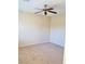Neutral bedroom features beige carpet, a ceiling fan, and neutral-colored walls at 7563 Captain Lord Ct, Las Vegas, NV 89166