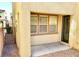 An outdoor patio with access to the house and gravel landscaping at 7563 Captain Lord Ct, Las Vegas, NV 89166