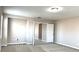 Neutral bedroom featuring patterned carpet, access to another room, and ample space for flexible arrangements at 7861 Hamilton Pool Dr, Las Vegas, NV 89113