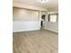 Open-concept living area featuring hardwood floors and an inviting atmosphere at 7861 Hamilton Pool Dr, Las Vegas, NV 89113