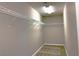 Spacious walk-in closet with installed shelving for maximum storage and organization at 7861 Hamilton Pool Dr, Las Vegas, NV 89113
