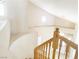 Hallway with a round window and view of the front entry shows the home's layout and design at 8432 Apple Hill Ct, Las Vegas, NV 89128