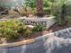 Entrance to Colonnades community with well-maintained landscaping, creating an inviting and attractive entrance at 8432 Apple Hill Ct, Las Vegas, NV 89128