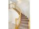 Staircase featuring wooden railings and carpeted steps at 8432 Apple Hill Ct, Las Vegas, NV 89128