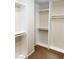 Bright walk-in closet with multiple shelves and hanging rods at 8432 Apple Hill Ct, Las Vegas, NV 89128