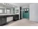 Bathroom featuring a dual sink vanity and shower stall at 8809 Barium Rock Ave, Las Vegas, NV 89143