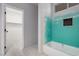A bathroom is under construction and features a tub and shower area ready for tile and a small window at 8809 Barium Rock Ave, Las Vegas, NV 89143