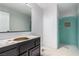 Bathroom with a blank vanity, shower stall, and a square window at 8809 Barium Rock Ave, Las Vegas, NV 89143