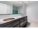 Bathroom featuring double sink vanity and blank canvas for new homeowner to transform at 8809 Barium Rock Ave, Las Vegas, NV 89143