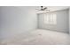 Light and airy bedroom featuring shutters over windows and ceiling fan; ready to transform at 8809 Barium Rock Ave, Las Vegas, NV 89143