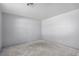 This bedroom features bright, natural light and a neutral color palette at 8809 Barium Rock Ave, Las Vegas, NV 89143