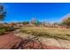A tranquil community park featuring a gazebo, inviting green spaces, and walking paths for residents to enjoy at 8809 Barium Rock Ave, Las Vegas, NV 89143