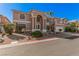 Stately two-story home with a grand entrance, arched windows, and a well-manicured lawn in a desirable location at 8809 Barium Rock Ave, Las Vegas, NV 89143