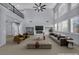 Spacious living room boasting large windows, fireplace, and modern decor at 8809 Barium Rock Ave, Las Vegas, NV 89143